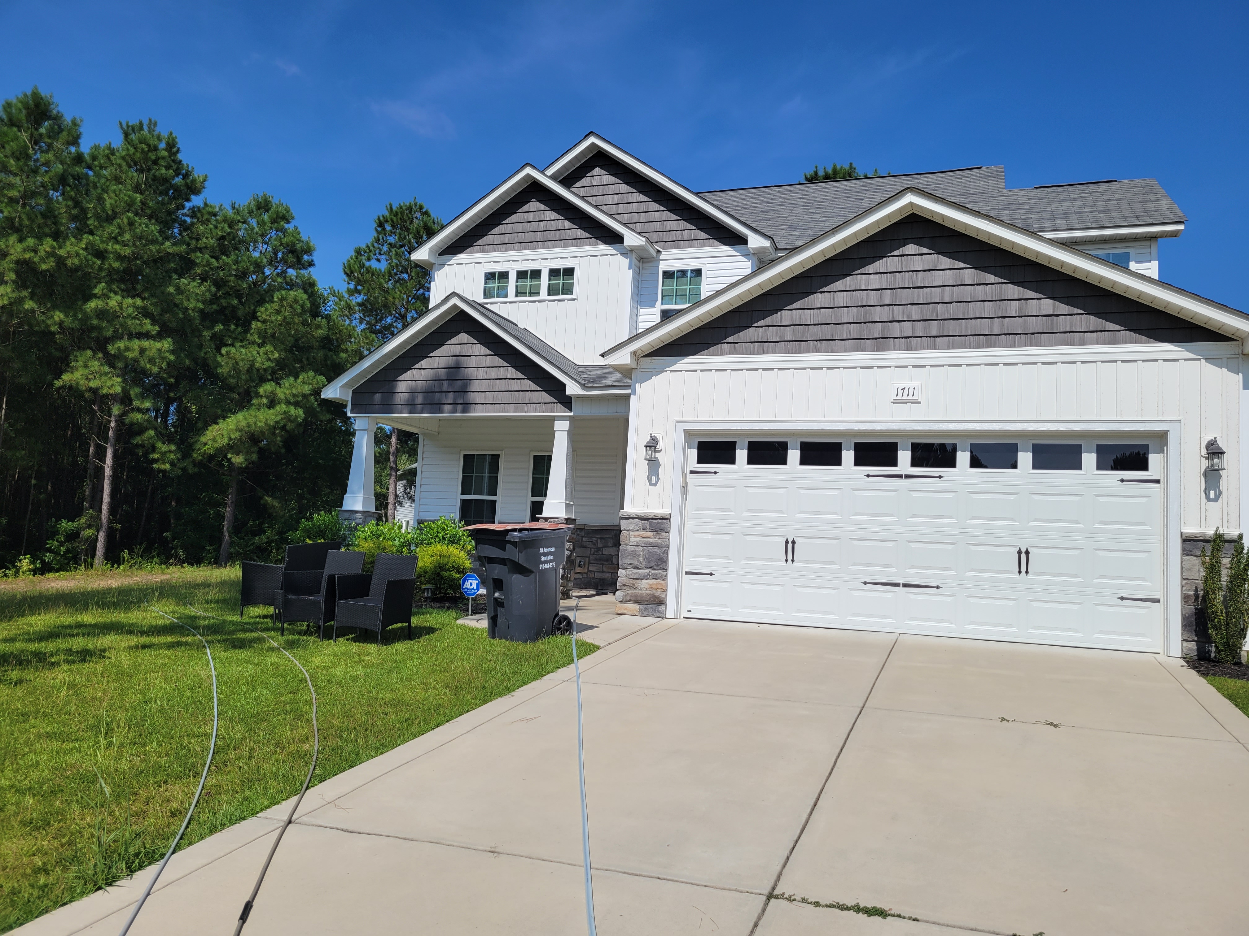 Rejuvenating Elegance: Revitalizing a White Vinyl 2-Story Home with PowerClean Plus